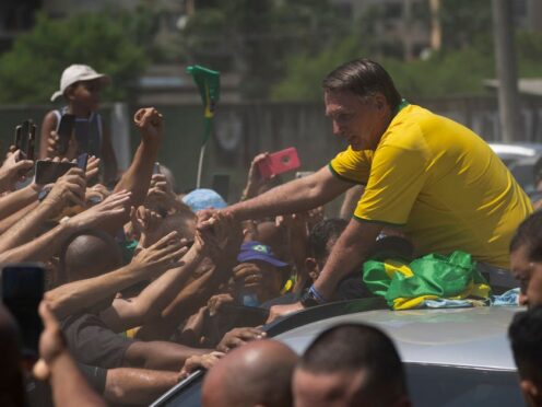Former Brazil’s President Jair Bolsonaro greets supporters after the launch of a campaign event launching the pre-candidacy of a mayoral candidate in Rio de Janeiro (Silvia Izquierdo/AP)