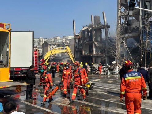 Rescuers were responding to a suspected gas leak explosion on Wednesday in a building in northern China (Ng Han Guan/AP)