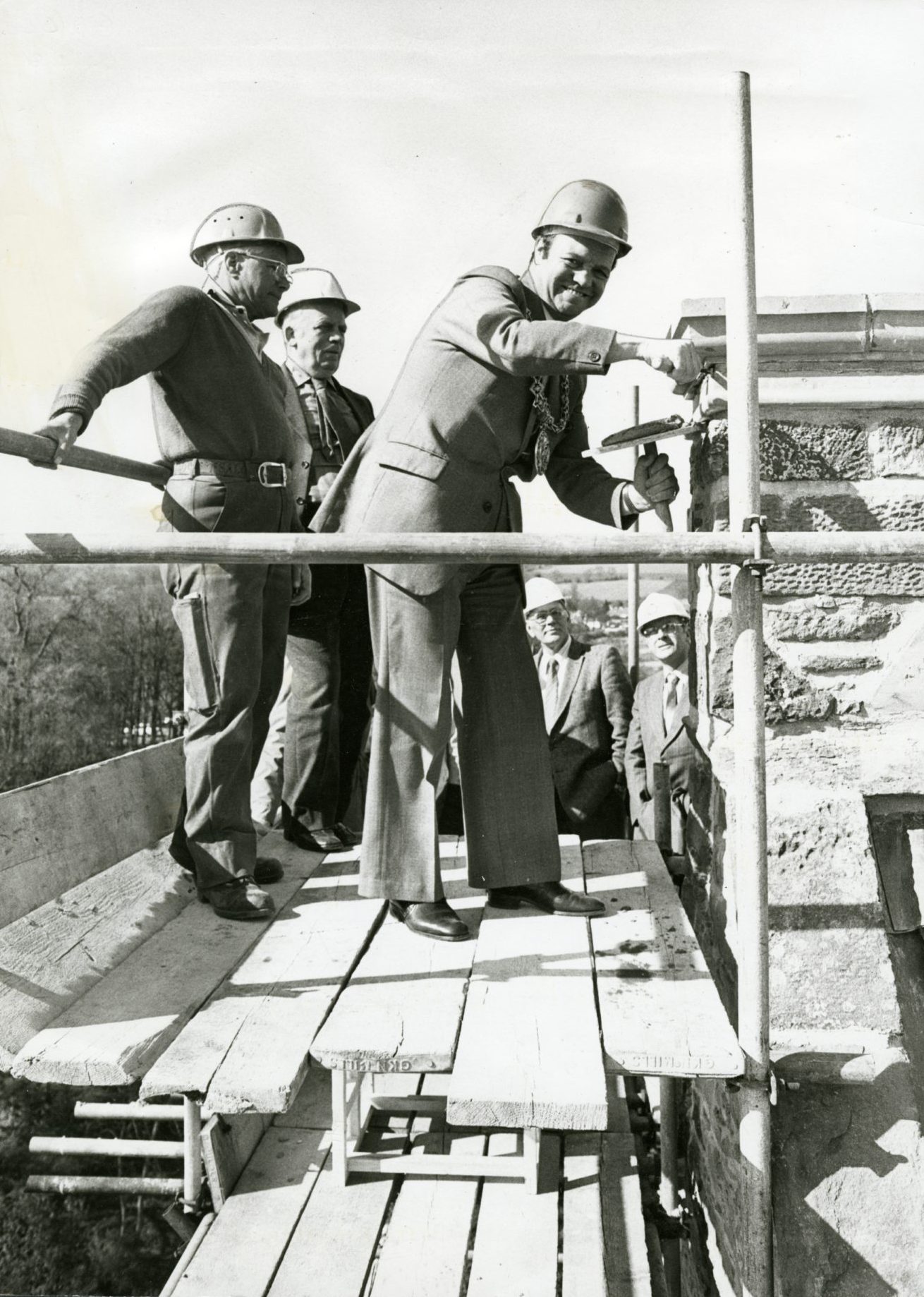 Lord Provost James Gowan with a hard hat on for the topping out ceremony at Mains Castle in April 1981.