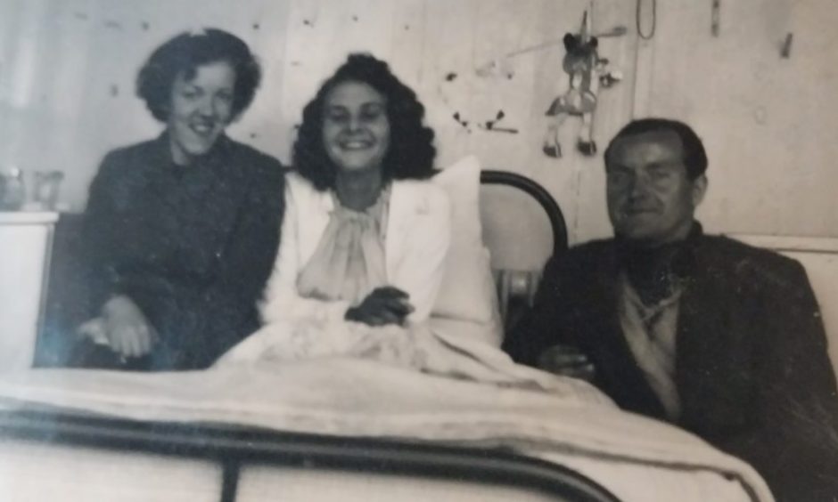Jutta in Ashludie Hospital with husband John and his sister, Marion.