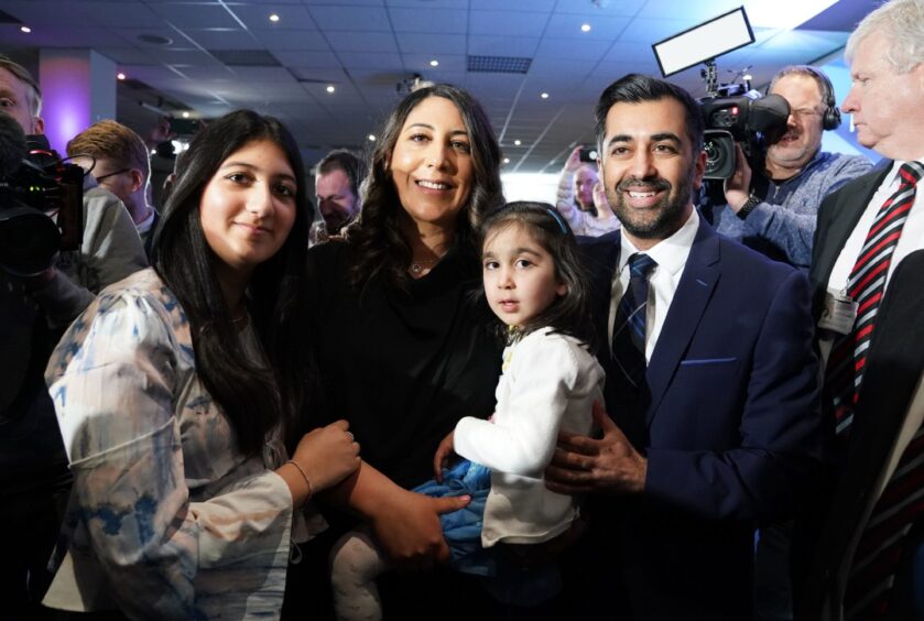 Humza Yousaf with his wife Nadia El-Nakla, daughter Amal and step-daughter Maya (left). Image: PA
