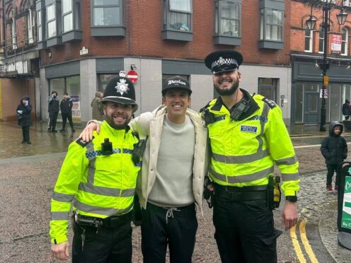 Detective Constable James Moult, Rob McElhenney and Sgt Dave Smith (Wrexham Police FC/PA)