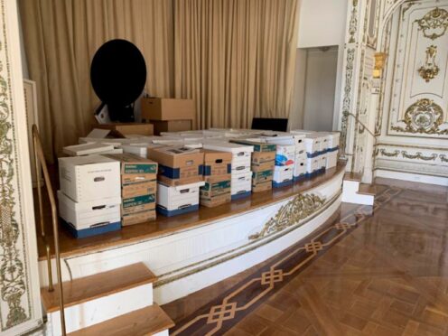 Boxes of records being stored on the stage in the ballroom at Donald Trump’s Mar-a-Lago estate in Palm Beach, Florida (Justice Department via AP)