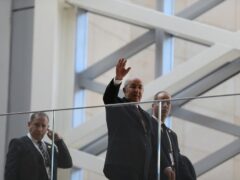 Algerian president Abdelmajid Tebboune waves (Anis Belghoul/AP)