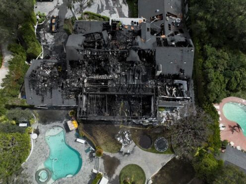 An aerial view shows a fire-damaged property, which appears to belong to Cara Delevingne (Jae C. Hong/AP)