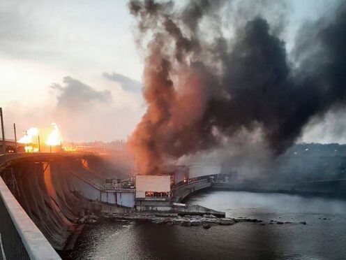 Smoke and fire rise over the Dnipro hydroelectric power plant after Russian attacks in Dnipro, Ukraine (Telegram channel of Ukraine’s Prime Minister Denys Shmyhal via AP)