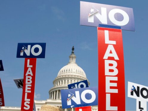 No Labels hold signs during a rally on Capitol Hill in Washington (AP)
