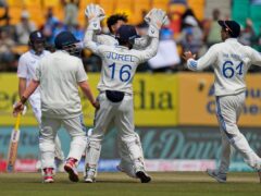India celebrate the wicket of Joe Root (AP Photo/Ashwini Bhatia)