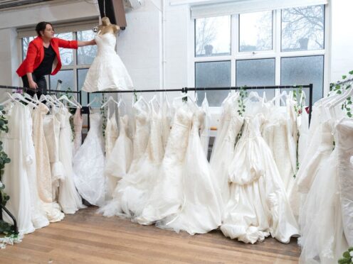 100 wedding dresses were donated to the British Heart Foundation in Sidcup, London, in memory of the late fashion designer who created them (Danny Fitzpatrick/PA)