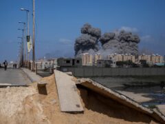 Smoke rises following an Israeli airstrike in the central Gaza Strip (Abdel Kareem Hana/AP/PA)