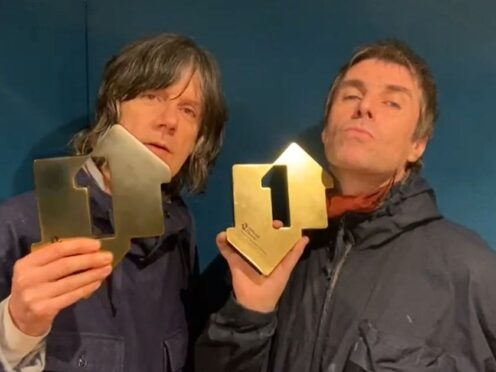 Liam Gallagher and John Squire with their Official Number 1 Album Award (Official Charts/PA)