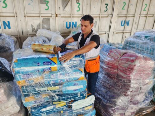 Aid for distribution to Palestinians (Hassan Eslaiah/AP)