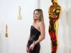 Margot Robbie arrives at the Oscars (Jordan Strauss/Invision/AP)