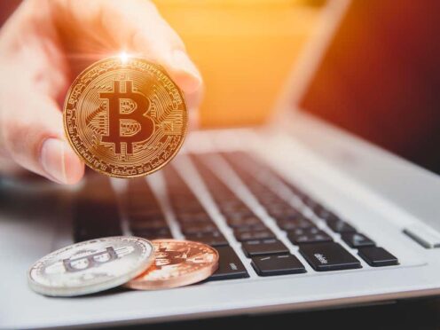 The price of Bitcoin has hit a fresh all-time high as Britain’s financial watchdog said it would allow cryptocurrency-linked exchange-traded products for professional investors (Alamy/PA)