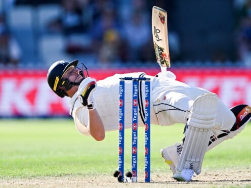 New Zealand’s Matt Henry bends backwards to avoid a delivery (Andrew Cornaga/Photosport/AP)