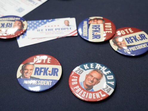 Buttons are displayed during a campaign event for US presidential candidate Robert F Kennedy Jr in Oakland, California (Eric Risberg/AP)