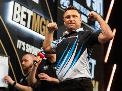 Gerwyn Price threw a nine-dart finish in the Premier League in Manchester (Taylor Lanning/PDC/PA)