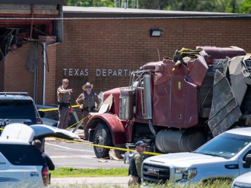 A stolen lorry crashed into a Texas Department of Public Safety office (Meredith Seaver /College Station Eagle via AP)