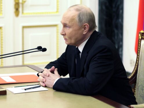 Russian President Vladimir Putin chairs a Security Council meeting in Moscow, Russia (Alexei Babushkin/AP)