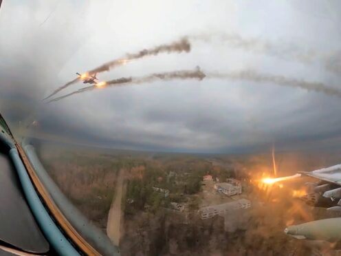 A Su-25 plane is seen firing rockets over Ukraine (Russian Defence Ministry Press Service via AP)