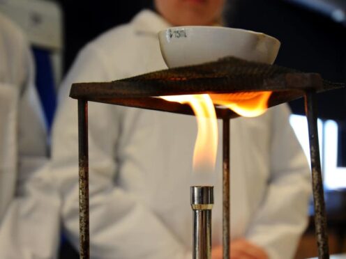 A science experiment taking place in a classroom (Lauren Hurley/PA)