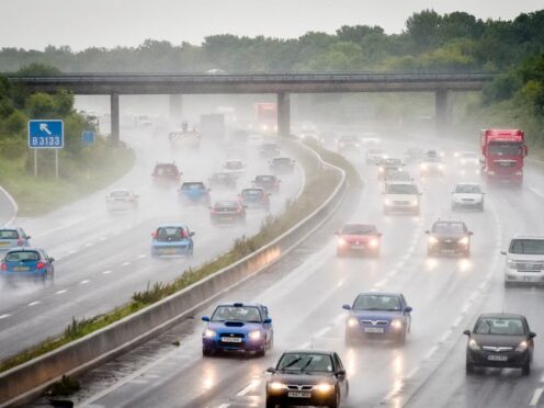 Motorists have been warned to expect heavy traffic and rainy conditions on bank holiday Monday (Ben Birchall/PA)