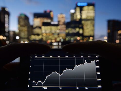 The UK’s FTSE 100 came within touching distance of an all-time high on Friday (John Stillwell/PA)