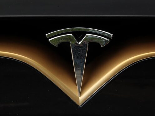 A Tesla logo (Niall Carson/PA)