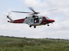 Two men were airlifted to hospital from the crash site in South Ayrshire (PA)