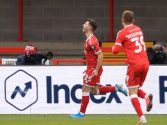 Crawley Town’s Nicholas Tsaroulla celebrates scoring his side’s first goal of the game during the Emirates FA Cup third round match at the People’s Pension Stadium, Crawley.
