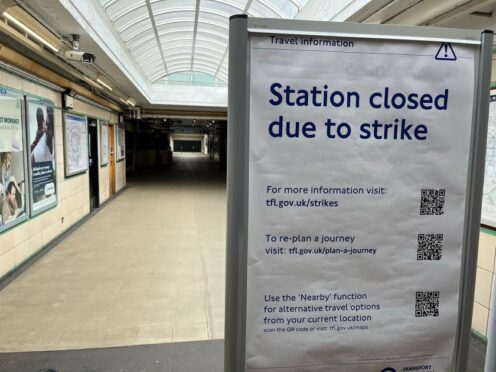 Strike signage during earlier industrial action (PA)