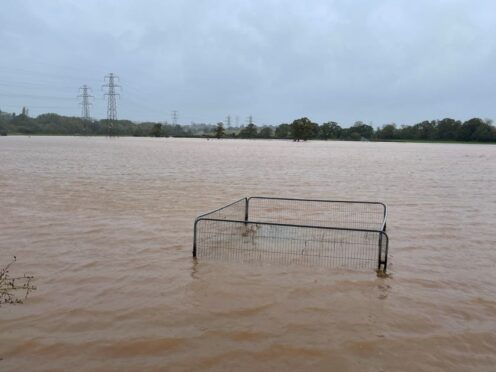 Flood water covers a field after the River Clyde overflowed in Clyst Saint Mary, near Exeter, in November (Ben Birchall/PA)