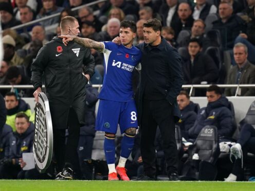 Chelsea’s Enzo Fernandez gets instructions from manager Mauricio Pochettino during the Premier League match at the Tottenham Hotspur Stadium, London. Picture date: Monday November 6, 2023.