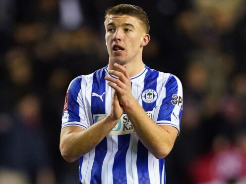 Charlie Hughes snatched victory for Wigan (Martin Rickett/PA)