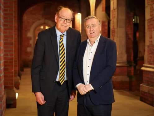 Stephen Grimason (right) with former UTV political editor Ken Reid at Queen’s University in Belfast in January this year (Press Eye/PA)