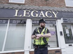 Police outside the Beckside branch of Legacy Independent Funeral Directors in Hull (Danny Lawson/PA)