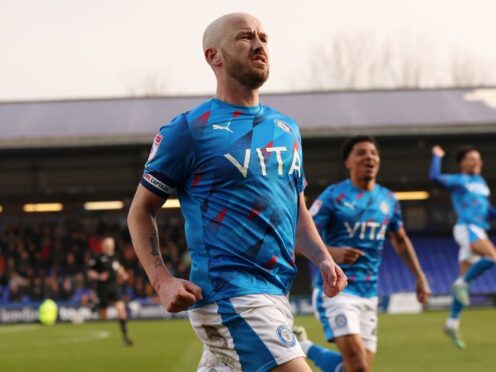 Paddy Madden scored another hat-trick to confirm Stockport as champions (Barrington Coombs/PA)
