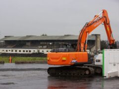 Contractors with excavators have begun clearing the concrete seating terraces at GAA stadium in Belfast, Northern Ireland, ahead of the long-delayed redevelopment of the stadium. The maintenance and pre-enabling works will run until April, when the demolition of the existing terraces will begin. The GAA is undertaking the initial phase of works amid continued uncertainty over the funding of the redevelopment. Picture date: Thursday March 14, 2024.