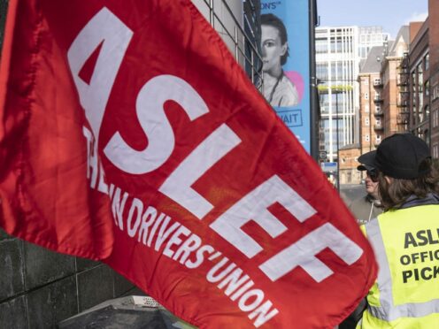 Members of the Aslef union at 16 train operating companies will strike in May (Danny Lawson/PA)