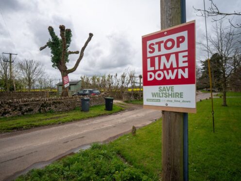 A Stop Lime Down sign near the proposed Lime Down solar farm site, in the Wiltshire countryside near Malmesbury (Ben Birchall/PA)