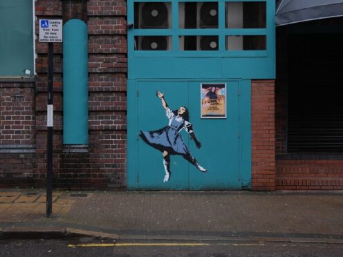 A mural depicting Dorothy from The Wizard Of Oz, on the side of Sidewalk bar on Kent Street in Birmingham (Jacob King/PA)