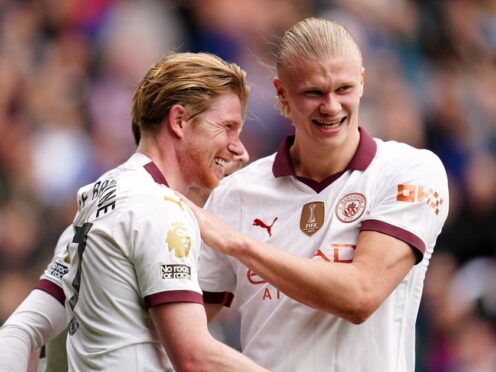 Kevin De Bruyne, left, celebrates with Erling Haaland (Adam Davy/PA)