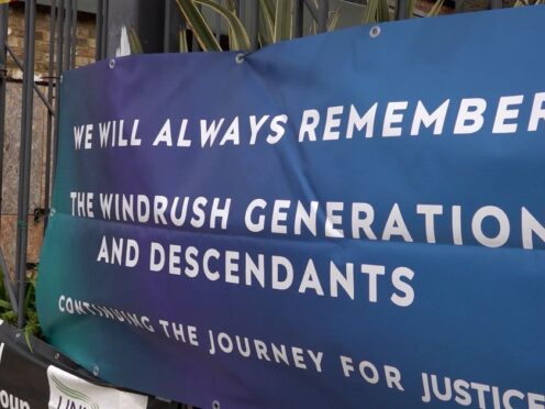 A decision to drop three recommendations made by a Windrush review ‘amounts to unlawful discrimination’, the High Court has been told (Kendall Brown/PA)