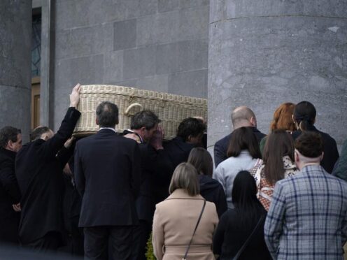 The coffin of Sarah McNally is carried into St Mel’s Cathedral, in Longford (Niall Carson/PA)