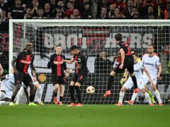Bayer Leverkusen’s Jonas Hofmann scores their first goal (PA Wire via DPA/PA)