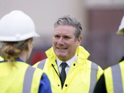 Labour Party leader Sir Keir Starmer talking to workers during a campaign visit to BAE Systems (Danny Lawson/PA)