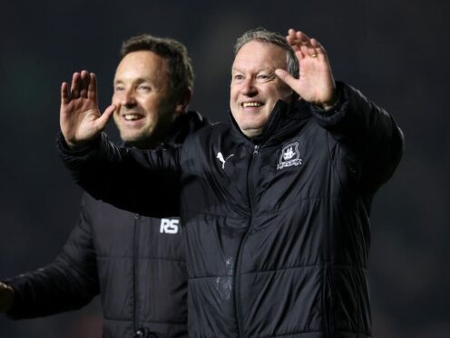 Neil Dewsnip celebrated Plymouth’s narrow win on Friday night (Steven Paston/PA)