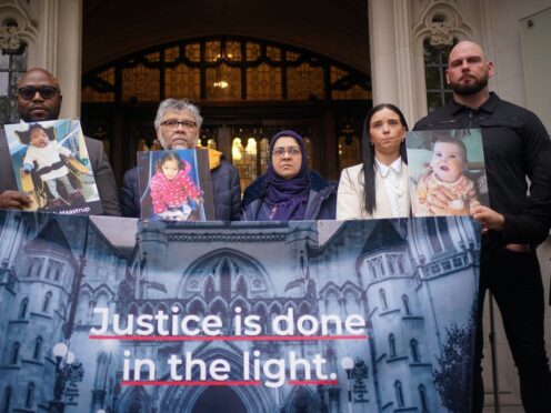 Lanre Haastrup, father of Isaiah Haastrup; Rashid and Aliya Abbasi, the parents of Zainab Abbasi, and Dean Gregory and Claire Staniforth, parents of Indi Gregory, stand outside the Supreme Court (Yui Mok/PA)