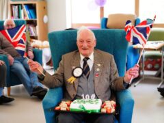 Former Second World War squadron leader and Royal Air Force fighter pilot Derrick Grubb marked his 100th birthday with a party (Ben Birchall/PA)