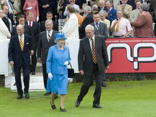 Derek Underwood, pictured with the Queen in his role as MCC president, has died (PA)